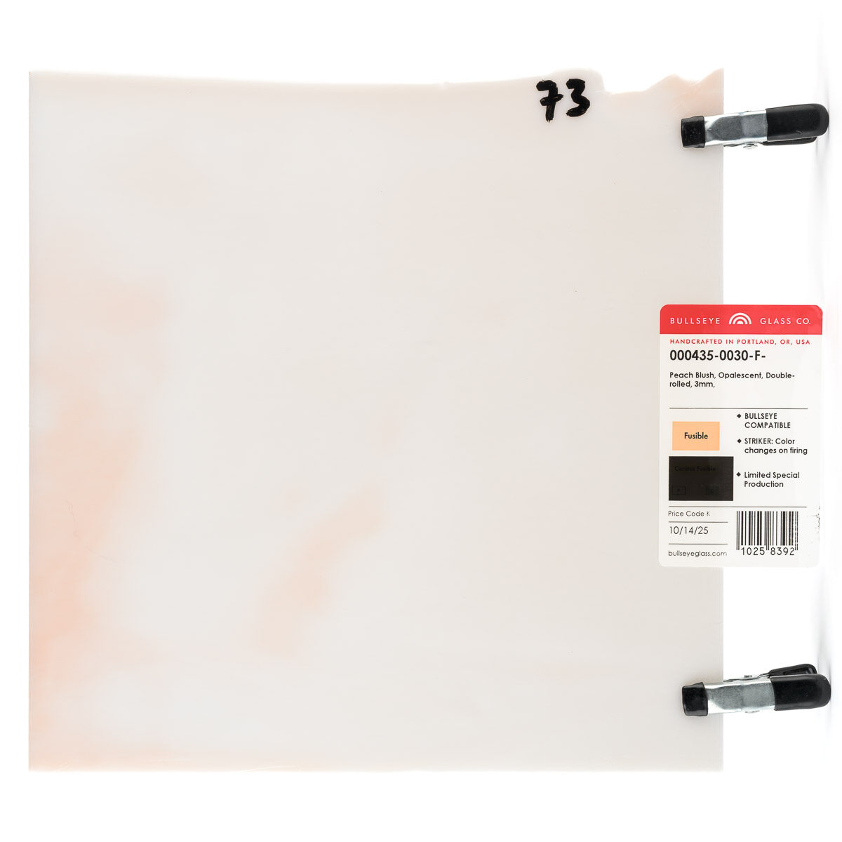 unfired square sheet of light peach-cream opalescent glass